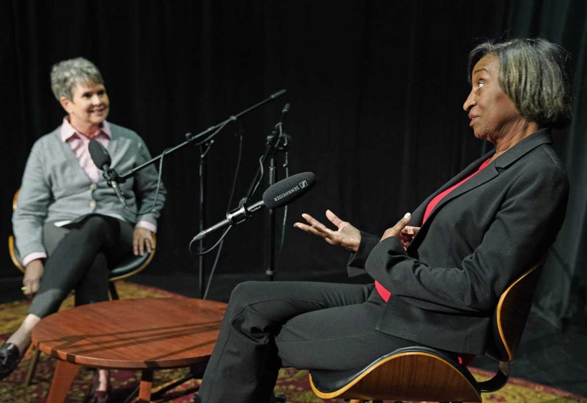 Host Demetria Kalodimos talks with former Nashville Banner reporter Tam Gordon. The two are seated at microphones, recording for the podcast Banner & Company